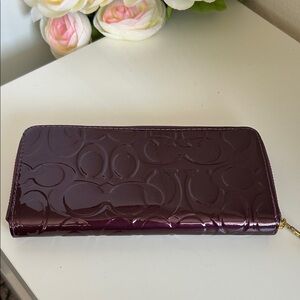 Coach Glossy Purple Embossed Wallet